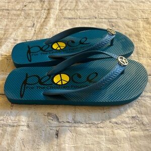 PEACE FOR THE CHILDREN FOUNDATION TEAL BLUE WITH YELLOW & BLACK SYMBOL SIZE 7/8